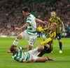 Rusul Sorokin (în galben-negru), în duel cu adersarii de la Celtic, miercuri seară Foto: Imago