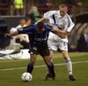 Ghioane (dreapta, în duel cu Ivan Cordoba), pe 30 septembrie 2003, la Inter - Dinamo Kiev 2-1 în grupele Ligii, meci în care a reușit un assist pe „Meazza” Foto: Imago
