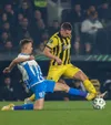 Răzvan Marin, duel cu Bancu la AEK - U Craiova Foto: Imago