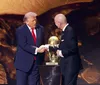 Trump și Infantino, la tragerea la sorți de la Washington, pe 5 decembrie. Președinții SUA și FIFA decid dacă se joacă CM 2026 Foto: Imago