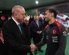 Hakan Calhanoglu și Recep Tayyip Erdogan, pe 14 octombrie 2025, în vestiarul naționalei, după 4-1 cu Georgia, la Kocaeli Foto: Imago