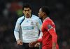 Luis Suarez și Patrice Evra (Foto: IMAGO)