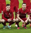 Diogo Jota (dreapta) și Andy Robertson, înaintea unui meci al lui Liverpool. Foto: Imago