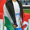 Assad Al-Hamlawi și Oleksandr Romanchuk, cu steagurile Palestinei și Ucrainei pe umeri, la bucuria Craiovei