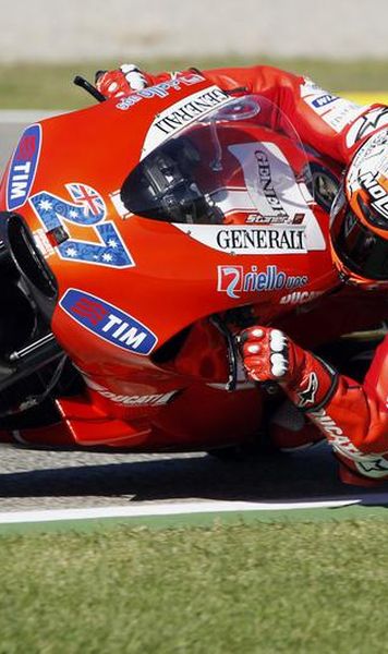 ​MotoGP Casey Stoner, pole position in ultima cursa a sezonului