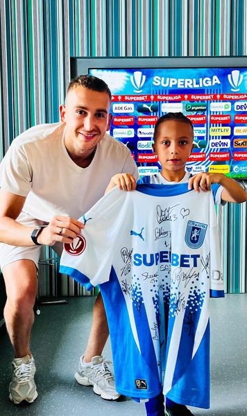 Rotaru și-a onorat promisiunea     FOTO.  Micul suporter al Craiovei care i-a cerut pixul   și-a primit cadoul