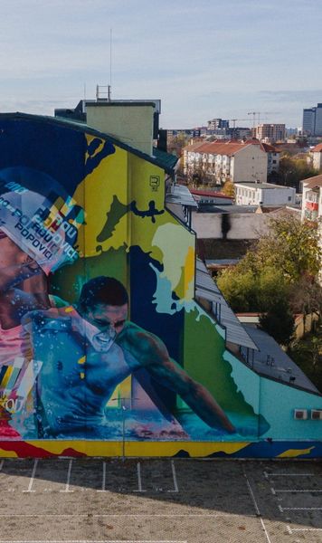 Popovici are un mural uriaș    FOTO.  Cum arată pictura de   400 de metri pătrați  care îl are în centru pe campionul olimpic și unde o poți vedea