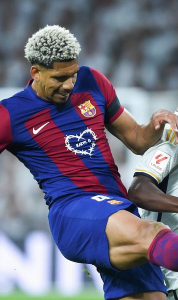 Rivalul, ajutor anti-depresie    Vinicius, starul revoltat al lui Real,  l-a susținut în clipele dificile pe Araujo, stoperul Barcelonei