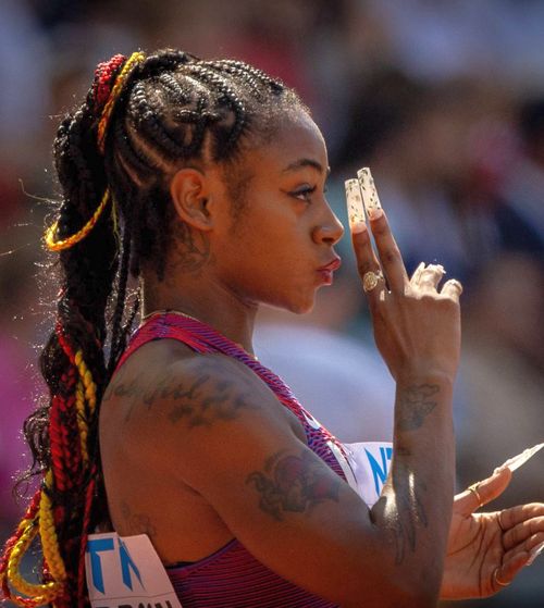 Acuzată de violență domestică  Medaliată cu argint la 100 de metri la Jocurile Olimpice,   arestată  pe aeroportul din Seattle