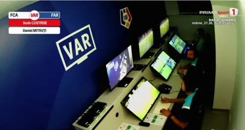 Sorin Costreie cu tigara electronica in camera VAR la FC Argeș - Farul. Capturi Prima Sport (2).jpg