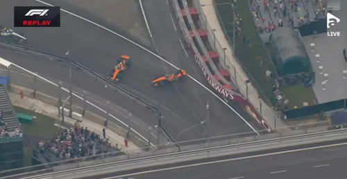 Accidentul dintre Lando Norris și Oscar Piastri din cursa de Sprint de la Singapore Foto captură video Youtube.jpeg