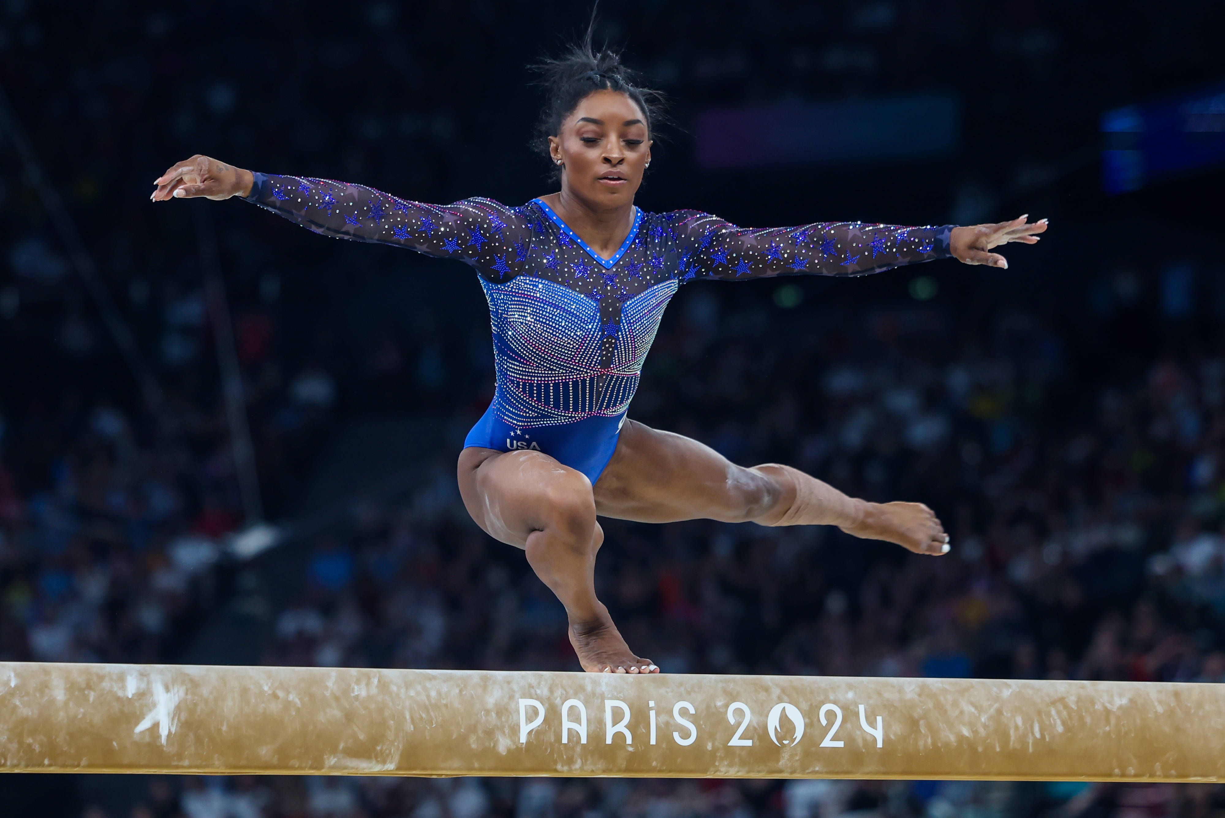 Simone Biles, la bârnă